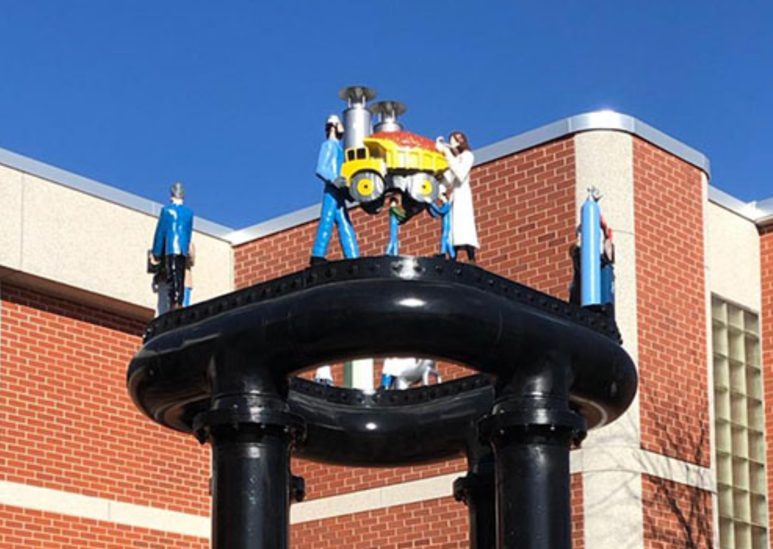 Start to Finish sculpture. This statue depicts scientists and engineers collaborating to solve a problem.