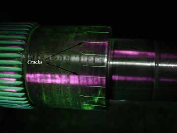  Drive shafts often develope thin cracks that can be detected with fluorescent magnetic particle inspection.