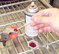 Penetrant can often be applied to a small area of a part by hand.