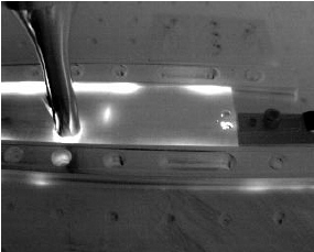 Vibrothermography and coupled with image processing can reveal defects in engineering parts.