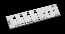 The miniature resolution block has a range of holes and slots for measuring near surface resolution.